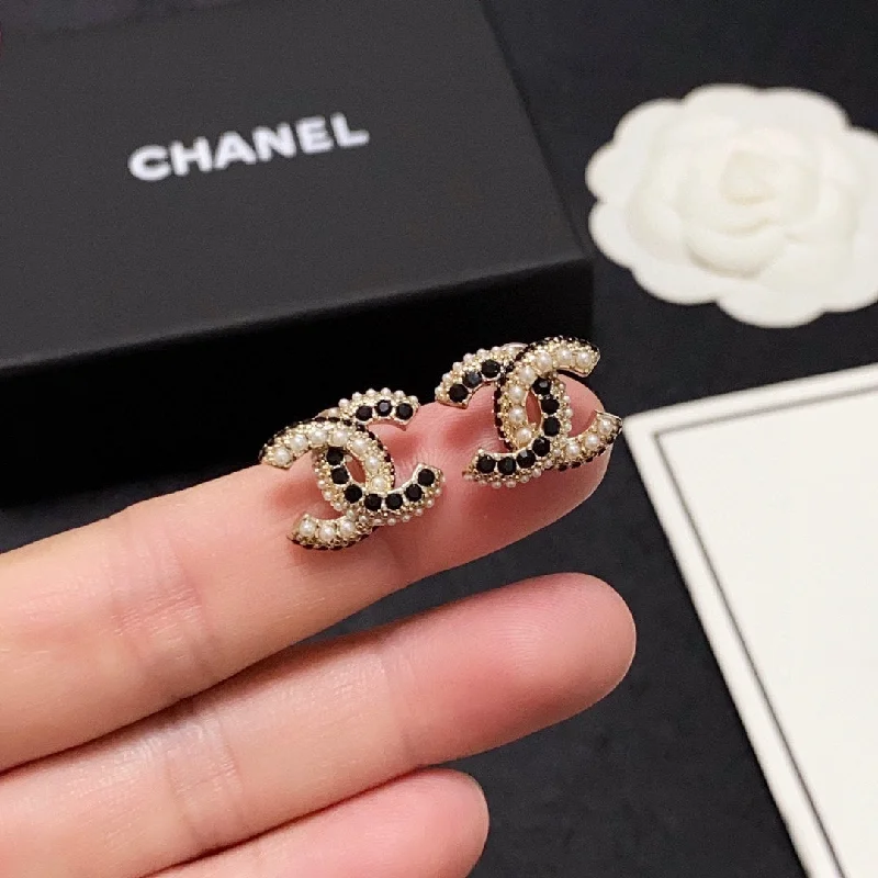 chanel Double C pearl black diamond earrings