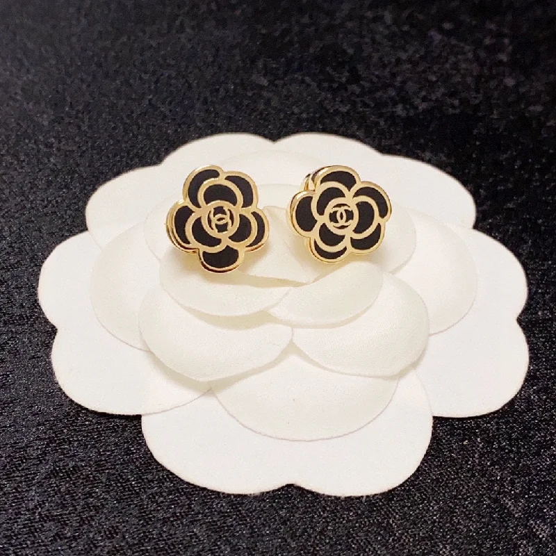 Chanel Nair black and white camellia double C earrings