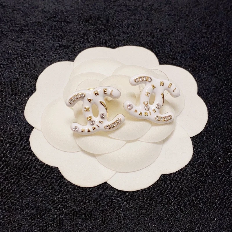 Chanel white diamond studded earrings